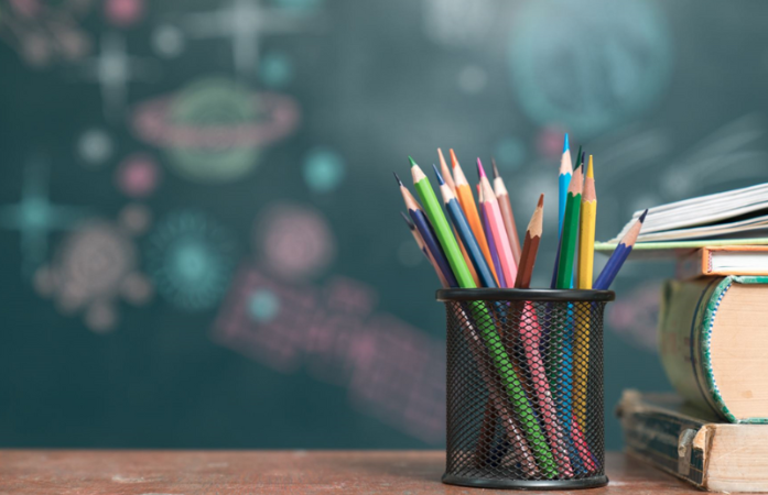  Pencils and a stack of books